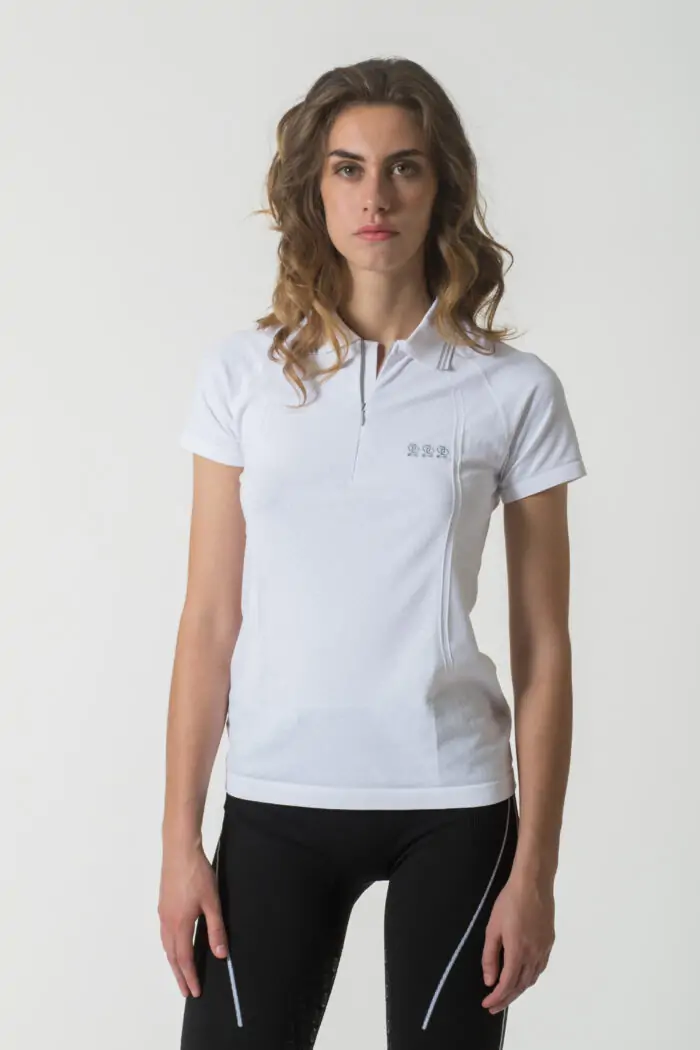 Polo da equitazione per allenamento Ziggy bianca – dettaglio jacquard zig zag e tessuto seamless tecnico.