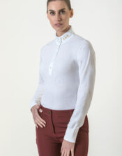 Polo concorso manica lunga donna "Cocka" di Accademia Italiana Style, tessuto seamless con motivo jacquard a coccarda, design tecnico elegante per equitazione.